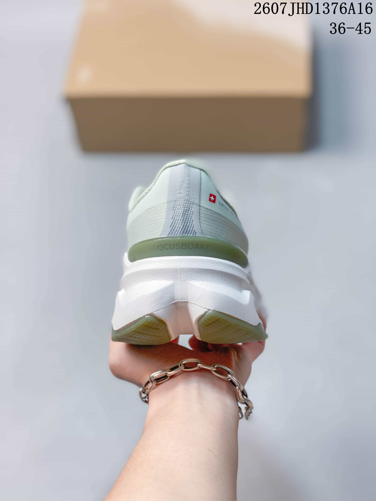 Rear view of an On Cloudpulse 2 sneaker showing the padded heel, green heel accent, and sculpted sole.