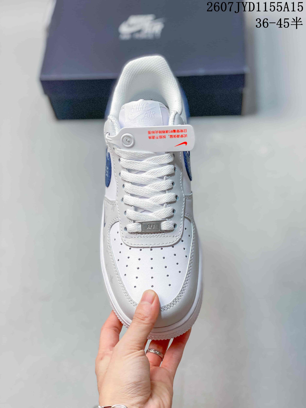 Top view showing the perforated white toe box, white laces, and tongue tag.