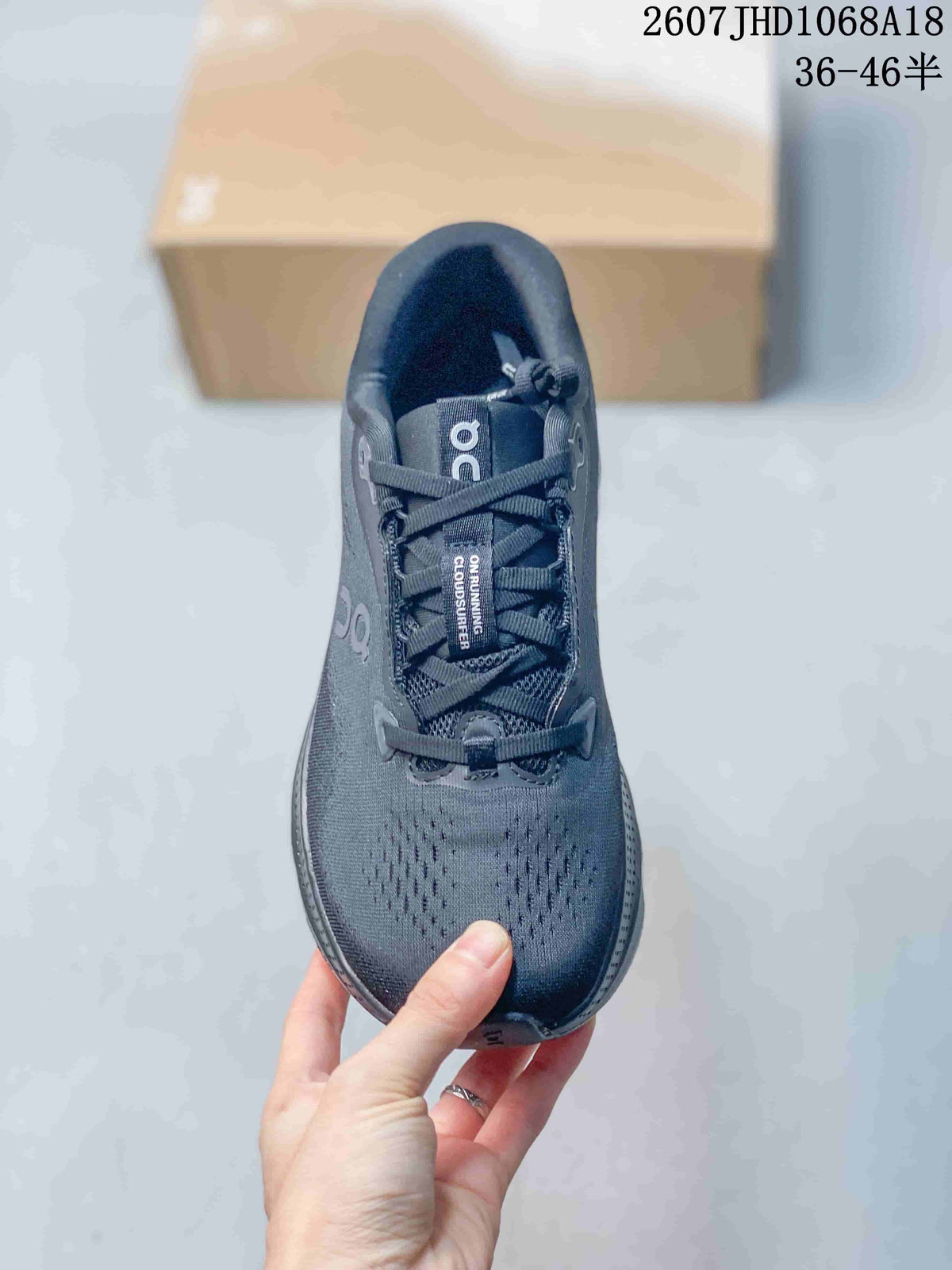 Top view showing the perforated toe box, laces, tongue, and On branding.