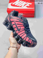 Black Nike Shox TL sneaker with red side panels