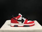 Close side view highlighting the red and white upper, black side arrow panel, black laces, and rubber outsole.