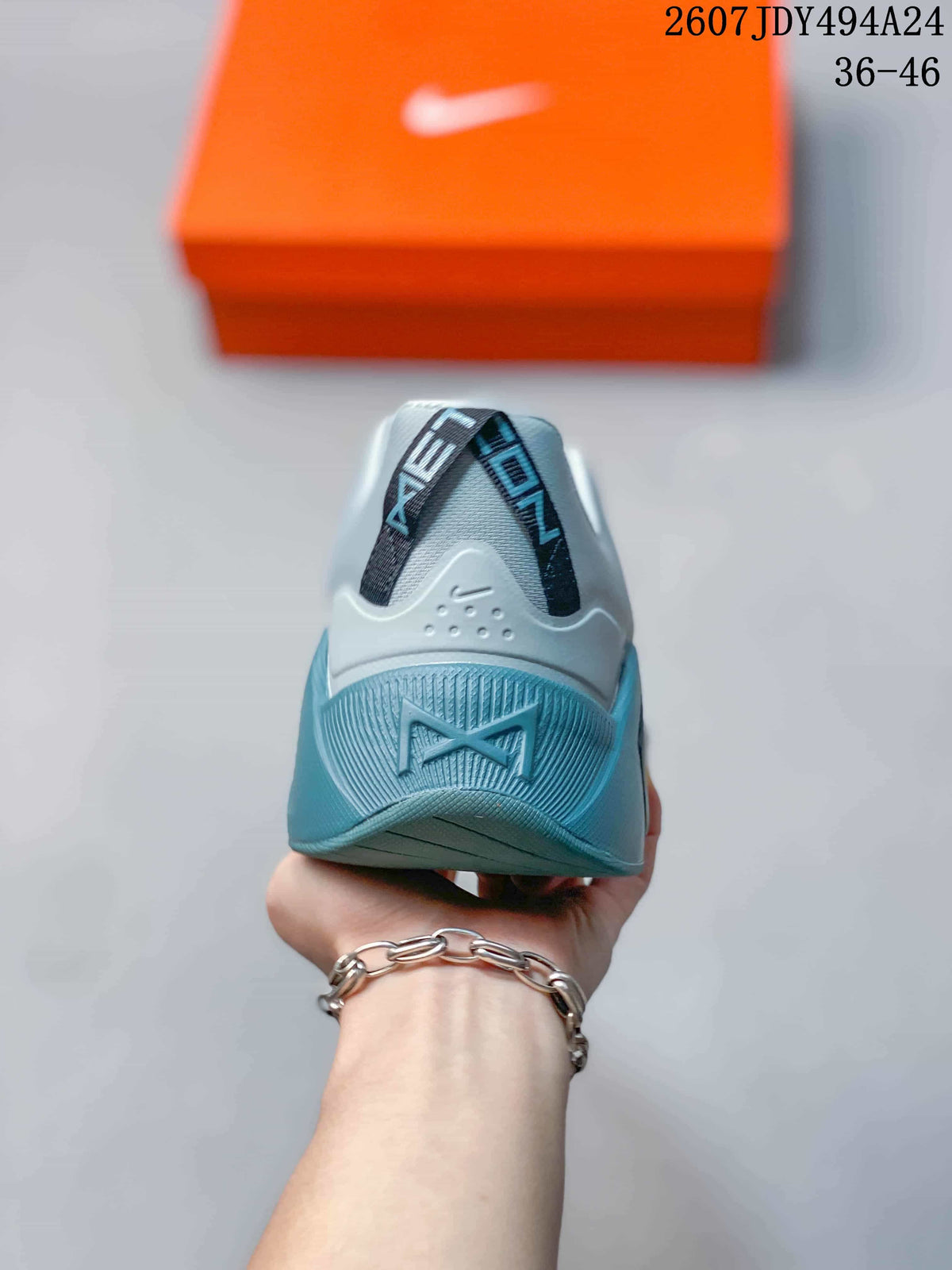 Rear view showing the structured heel and blue heel accent of the sneaker.