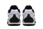 Rear view of the white, black, and gold basketball shoes