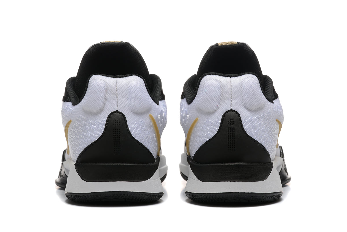 Rear view of the white, black, and gold basketball shoes