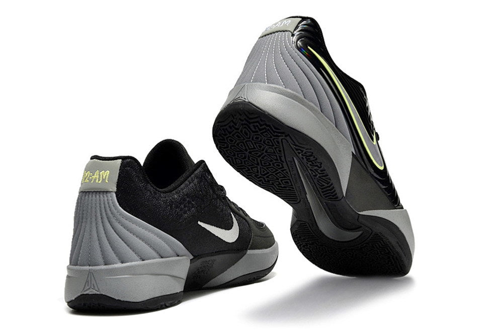 Black and red Ja 2 shoes shown from the heel and outsole.