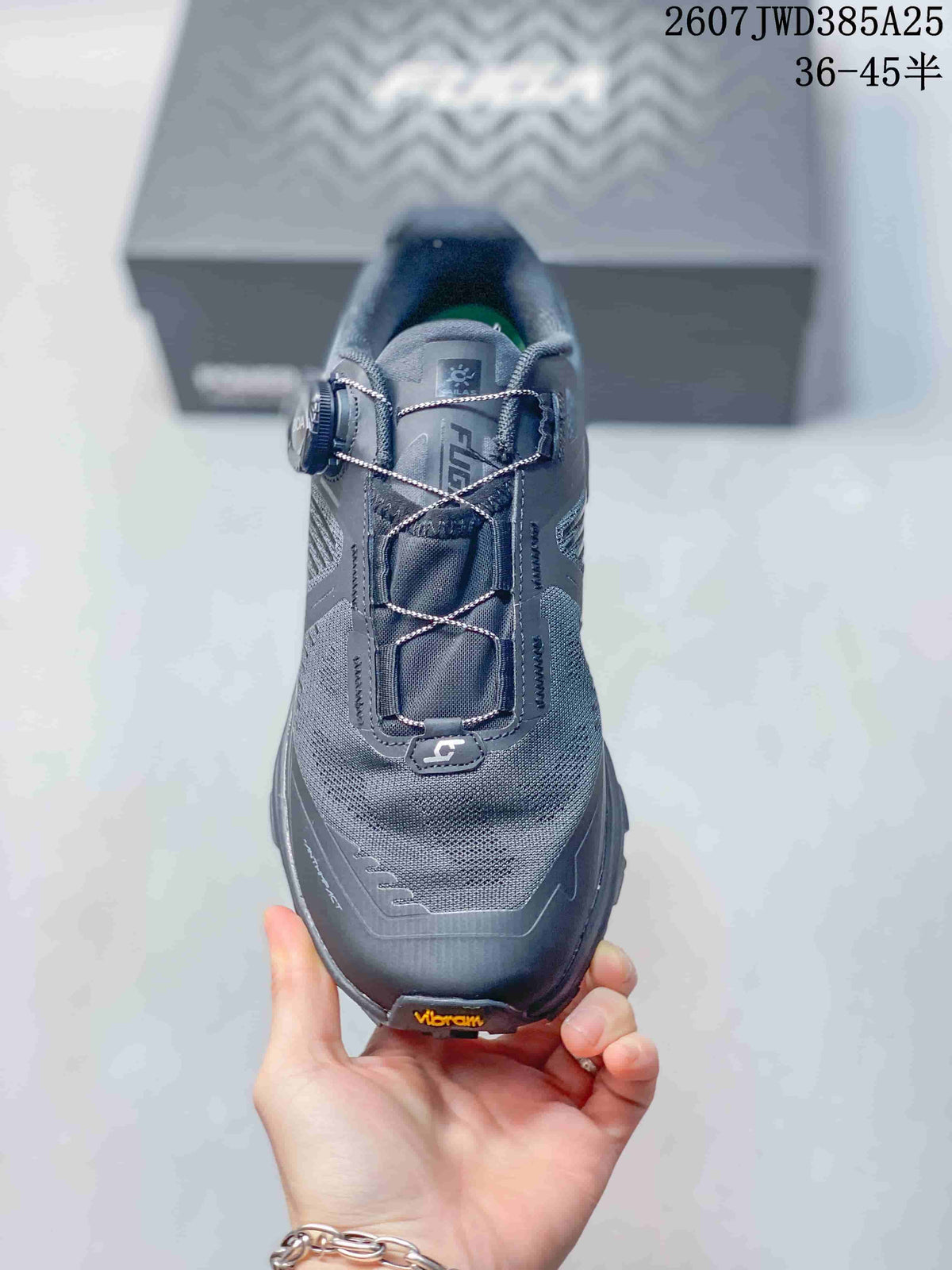 Top view showing the dark gray mesh upper, BOA dial closure, structured toe area and padded collar.