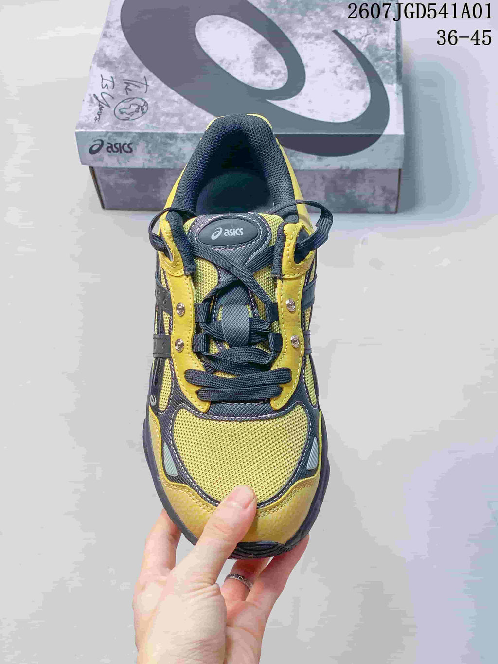 Top view of the sneaker showing its laces, tongue and mesh toe