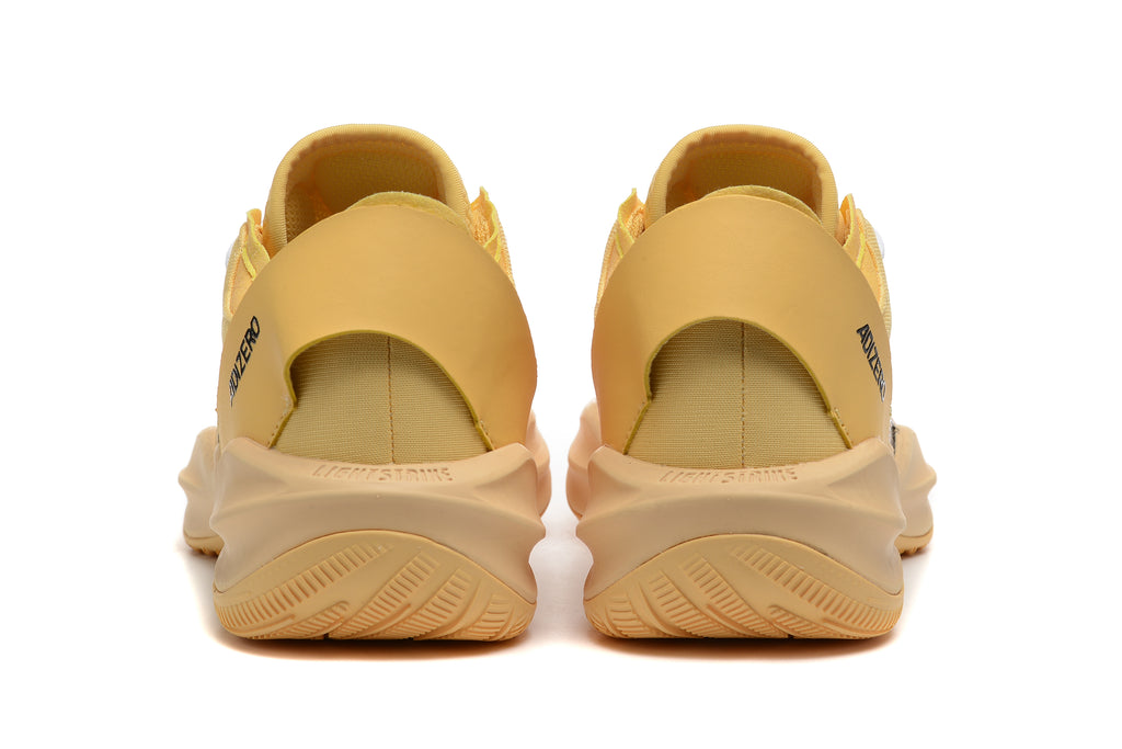 Rear view of yellow Adidas Adizero shoes