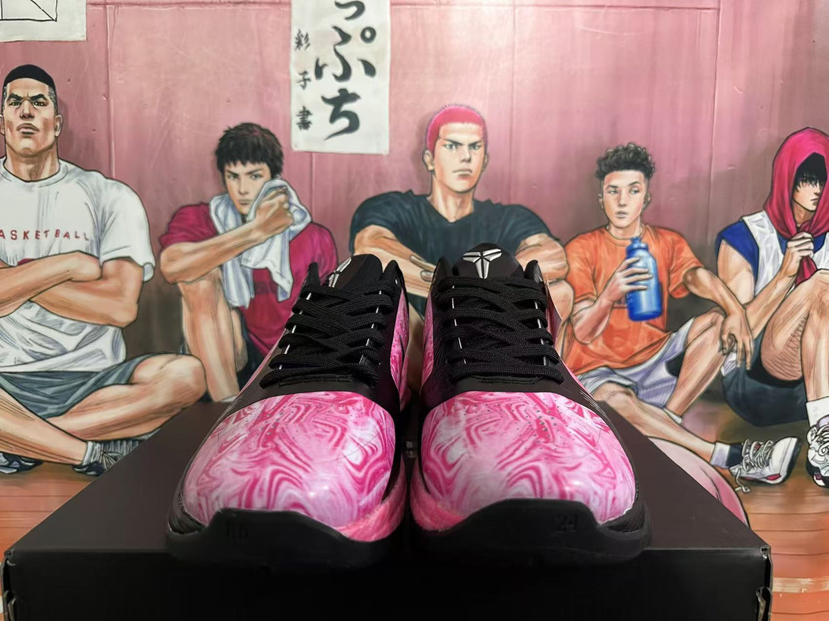 Front view showing pink marble-patterned toe panels and black laces