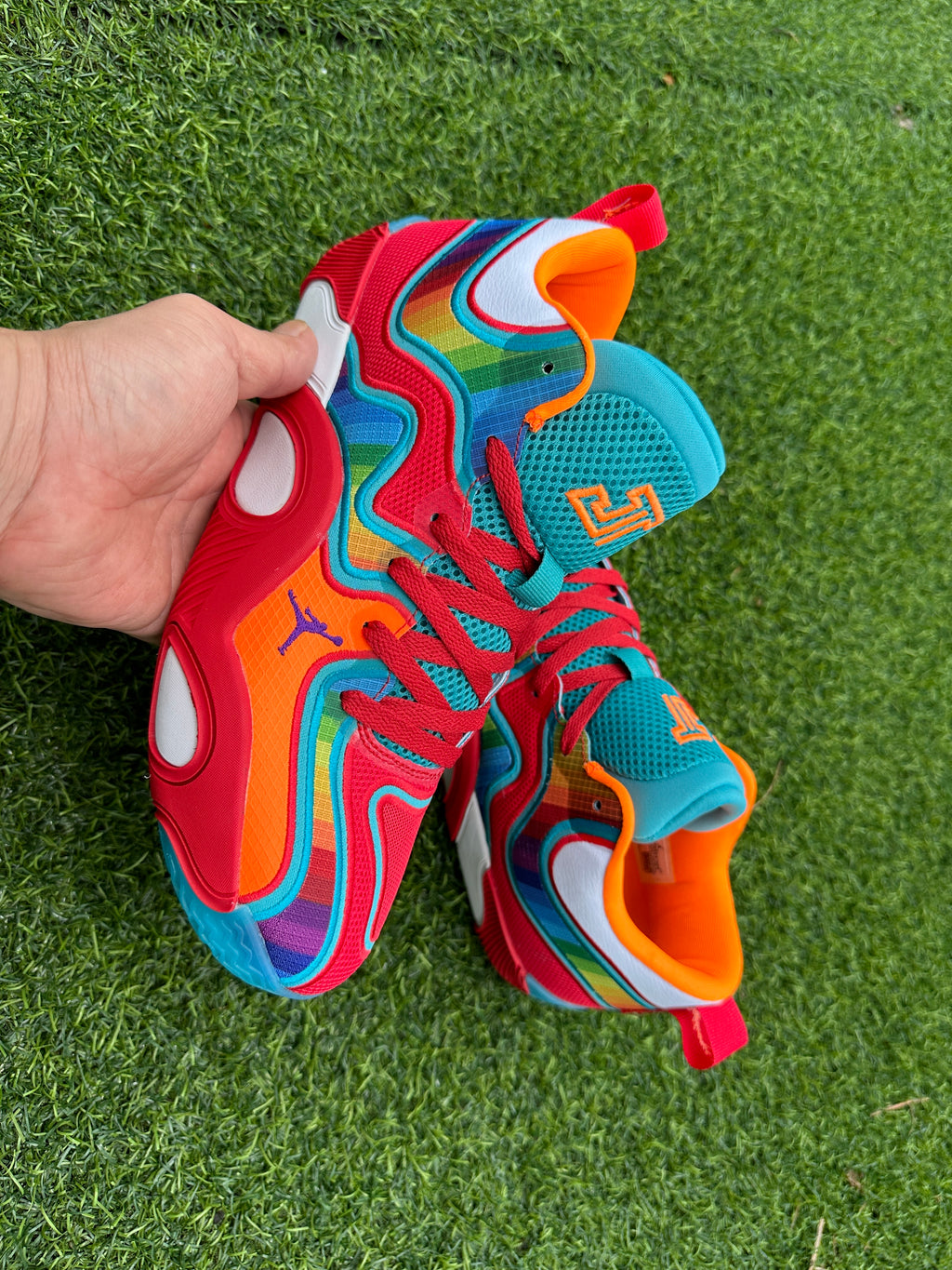 Angled top view of the multicolor Jordan high-tops