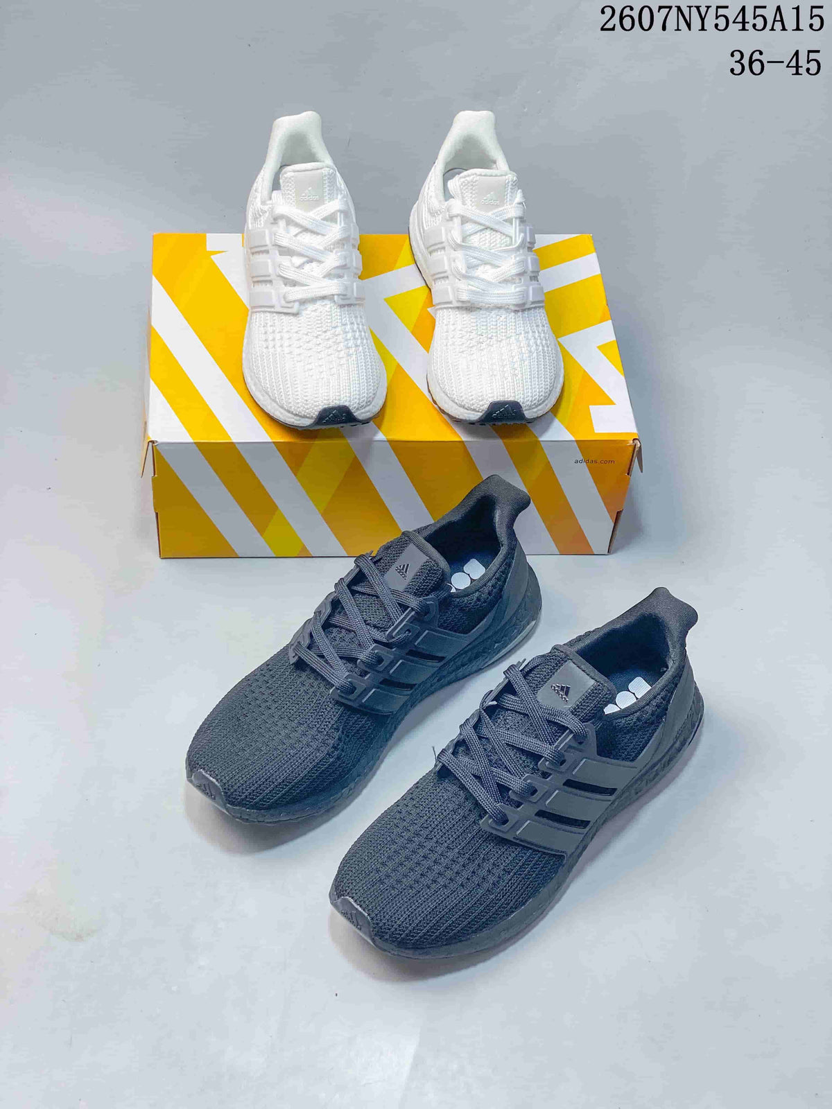 White and dark gray Adidas Ultraboost Light sneakers shown together from above.