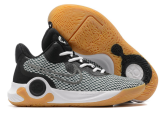 Small product view of a gray and black basketball shoe with gum outsole accents.