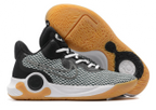 Small product view of a gray and black basketball shoe with gum outsole accents.