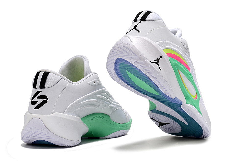 Rear and outsole views of white and green Jordan Luka 3 basketball shoes