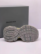 Underside view displaying the segmented rubber outsole and textured tread pattern.