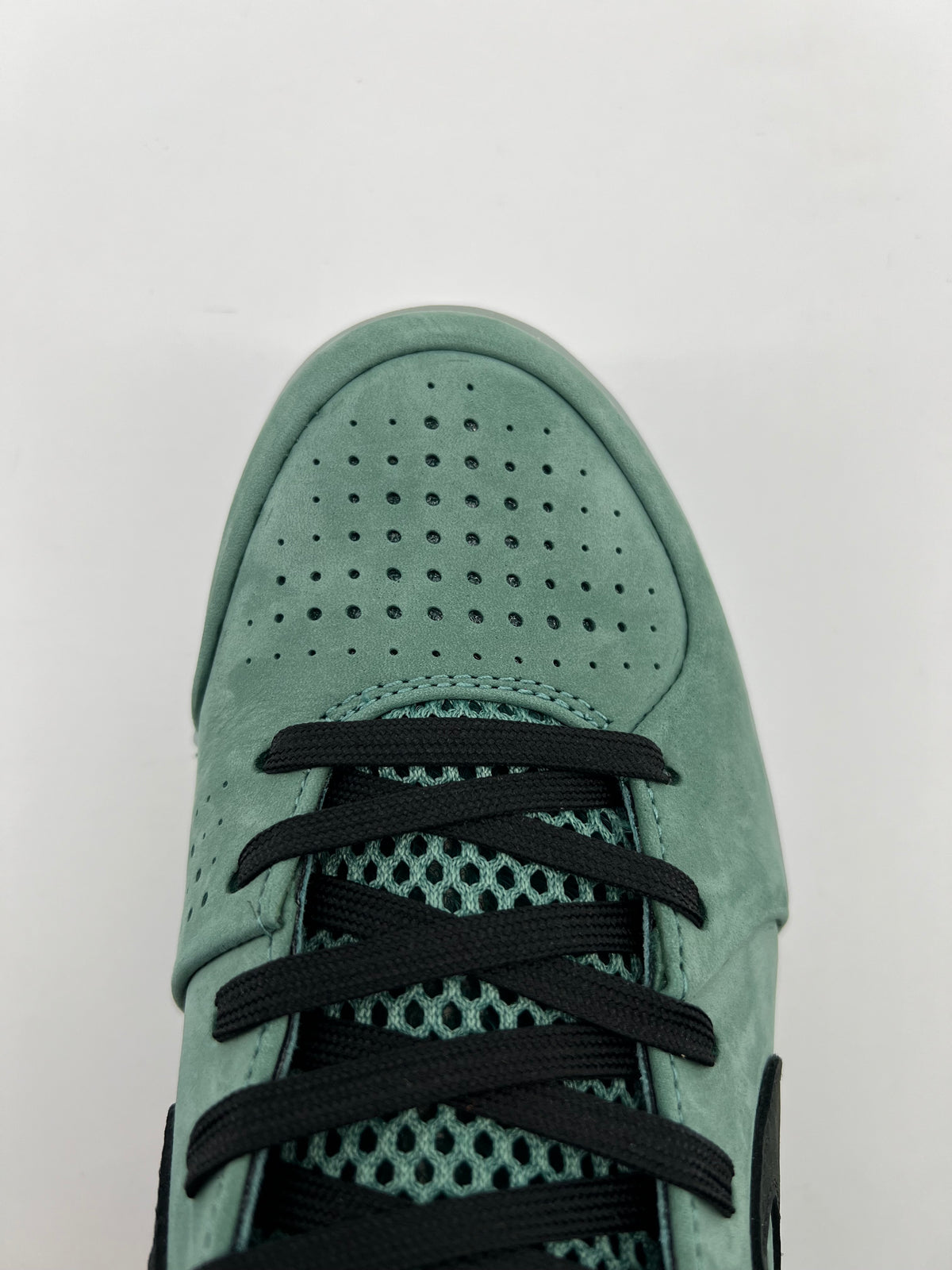 Top-down view of the perforated toe and lacing