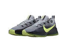 Pair of gray and lime-green Nike training shoes on a white background.