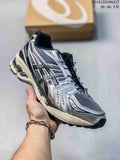Silver and black mesh running sneaker with a sculpted segmented sole