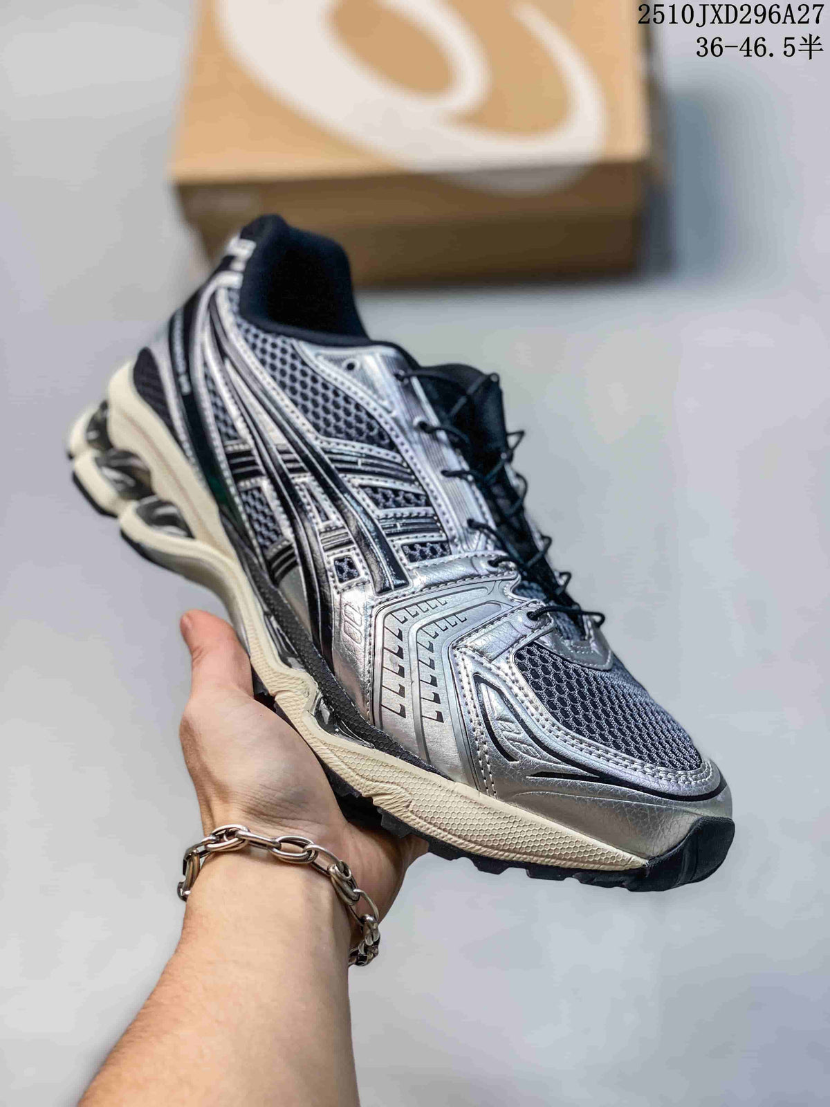 Silver and black mesh running sneaker with a sculpted segmented sole