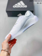 Side profile of a white low-top training shoe showing the mesh upper, lace area and outsole.