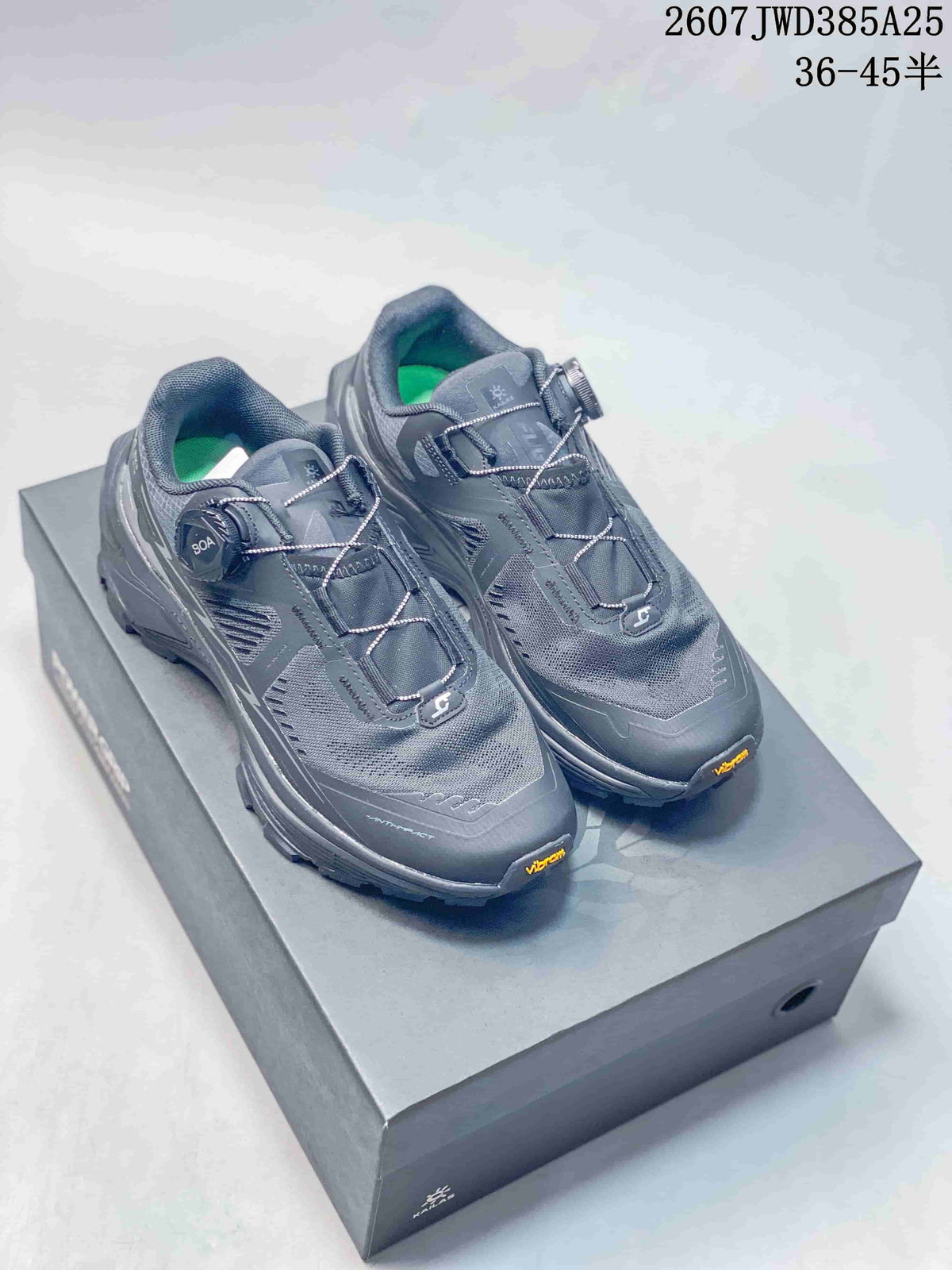 Pair of dark gray Kailas FUGA EX3 BOA shoes displayed on a shoe box, with the BOA dial and product size range marking visible.