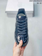 Top view showing the lace-up construction, layered toe panels and padded tongue.