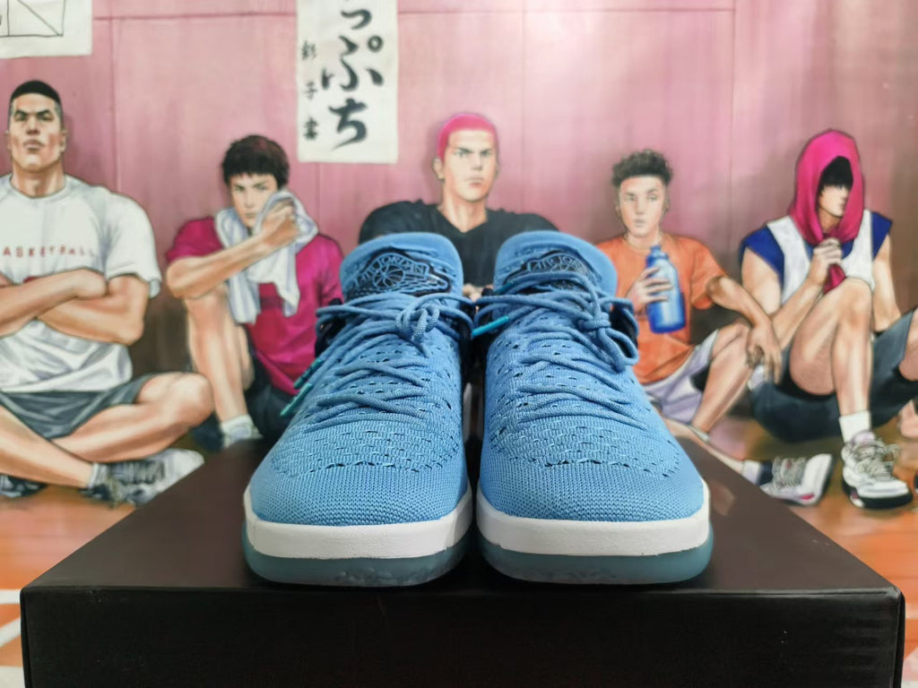 Front view showing the blue upper, laces, and translucent outsole
