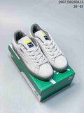 Pair of white and gray PUMA BMW MMS Suede XL sneakers displayed on a green shoebox; image text shows style code 2607JDD293A13 and size range 36–45.