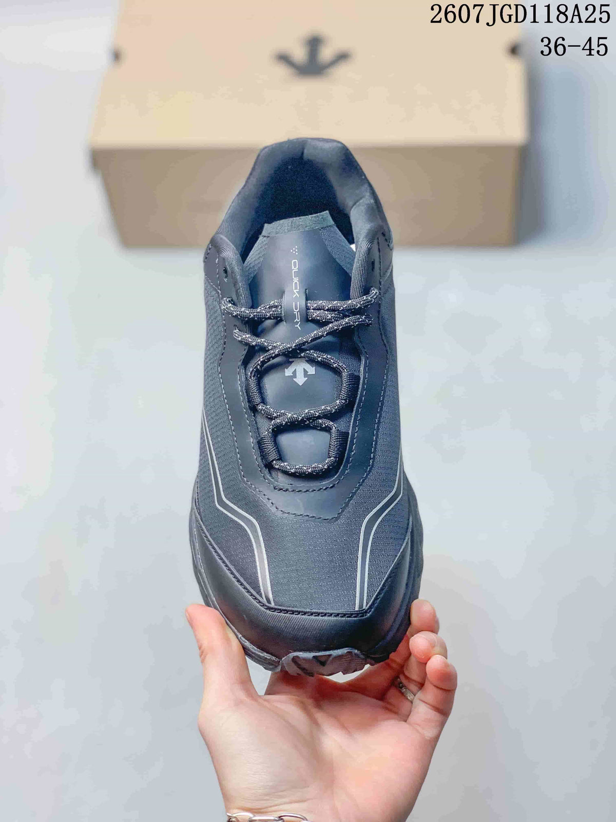 Top-down view showing the lace-up closure, padded collar and reflective-looking lines across the upper.