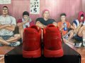 Rear view of red basketball sneakers with red heels and outsoles
