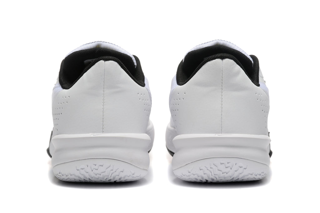 Rear view of the white Nike basketball shoes with black collars
