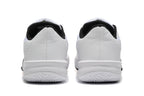 Rear view of the white Nike basketball shoes with black collars