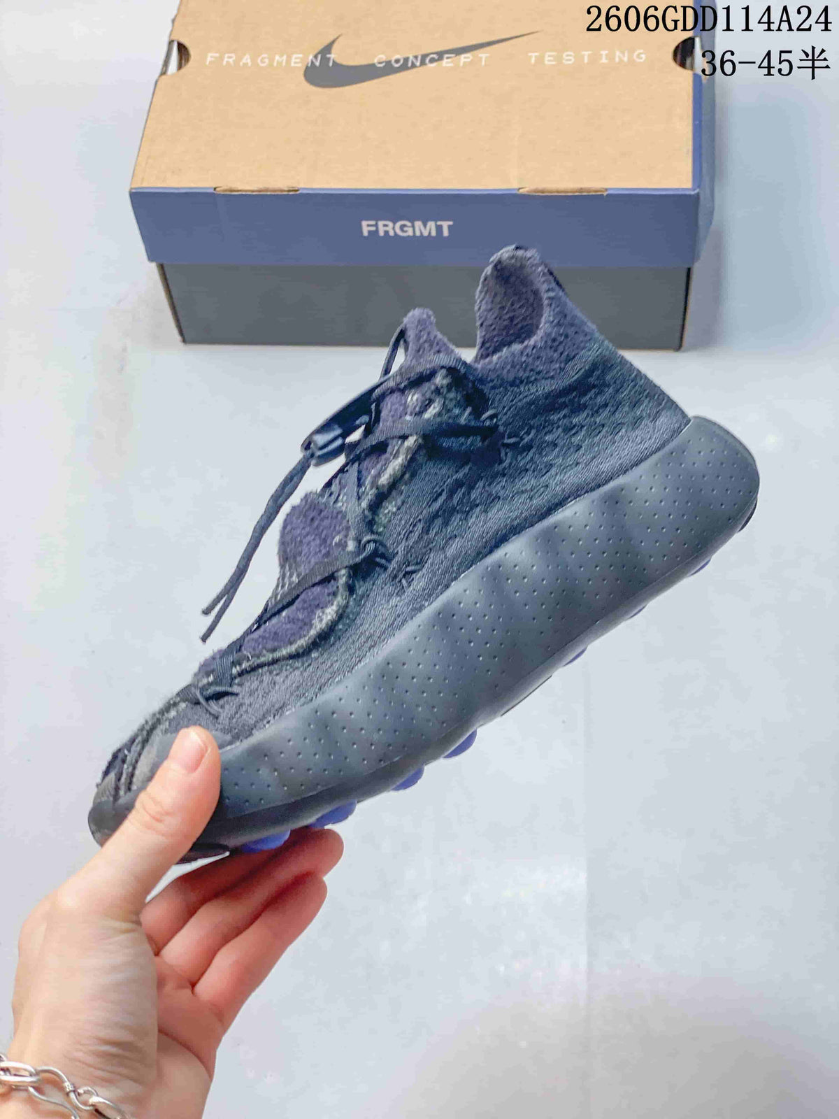 Side view showing the knit-look upper and sculpted sole