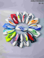 A group of adidas Adizero Prime X3 shoes shown in assorted color combinations.