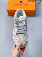 Top view showing patterned toe panel and textured laces.