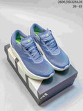 Blue adidas Supernova Rise 3 running shoes displayed on a shoebox