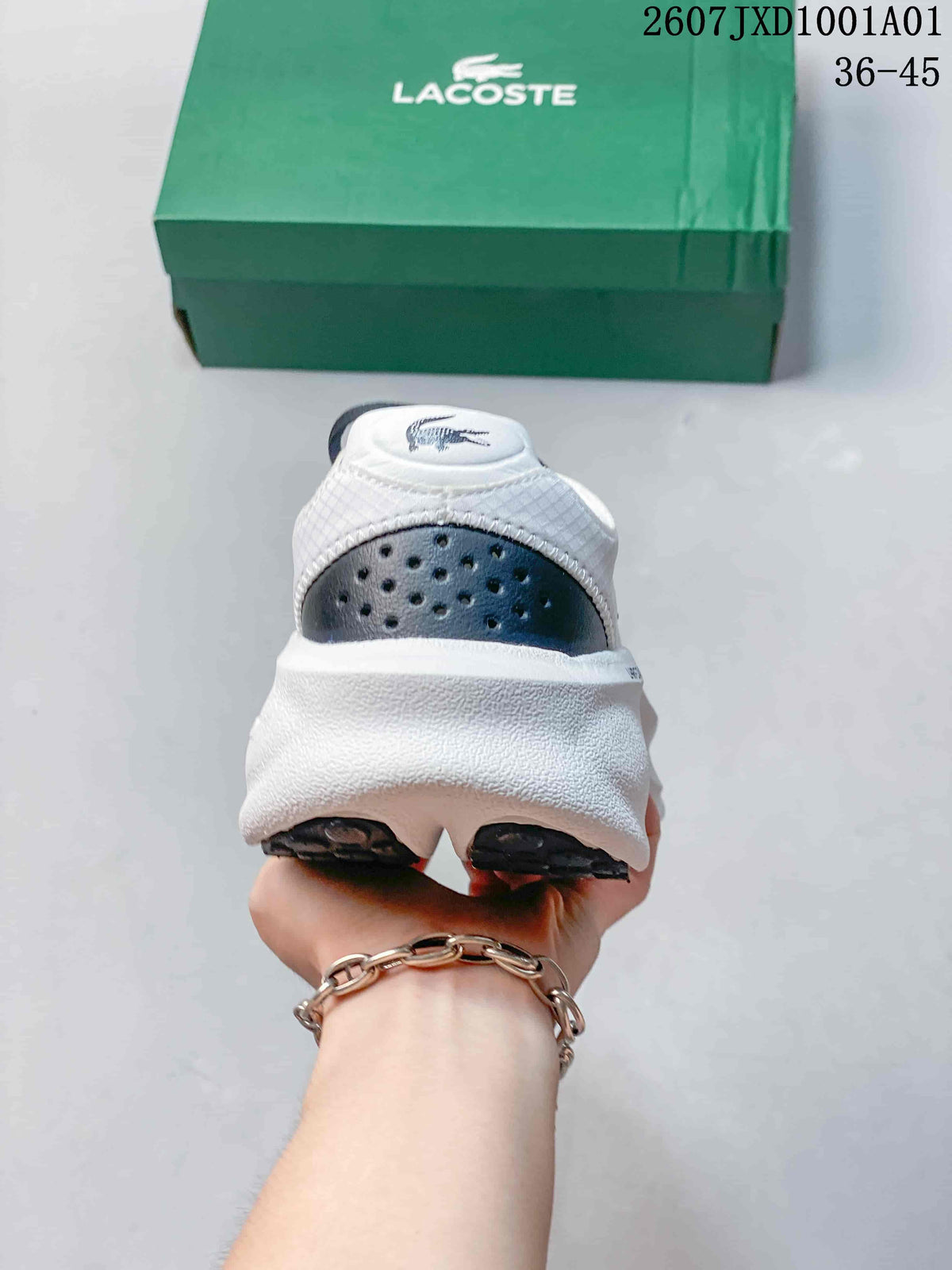Rear view showing the white heel, navy heel detail, and crocodile emblem