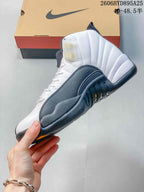 Side view highlighting the white upper, dark side panel, and high-top shape.