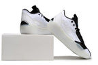 White and black Jordan Luka 39 shoes shown beside a shoebox