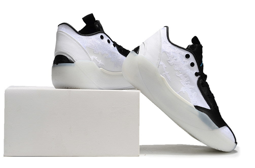 White and black Jordan Luka 39 shoes shown beside a shoebox