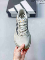 Top view of the sneaker showing the lace-up front, textured toe area, and contrasting side details.
