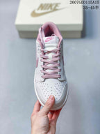 Top view showing the white perforated toe box, pink laces, padded collar, and tongue branding; image text shows style code 2607GDD115A15 and size range 35–45.