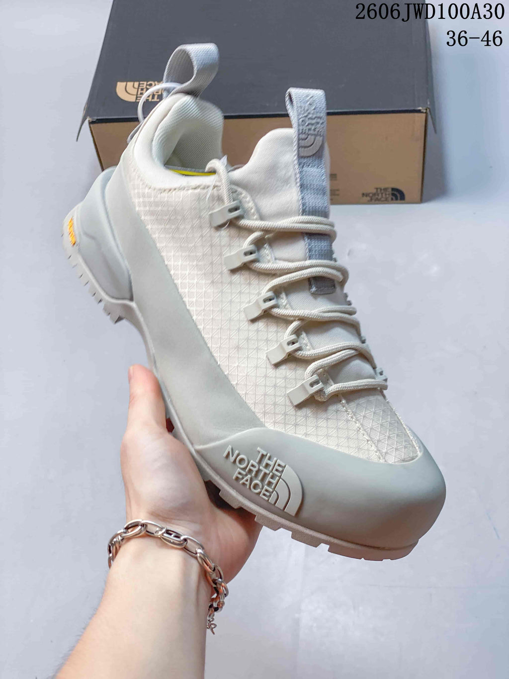 Angled front-side view showing the shoe's upper, laces, and protective toe area