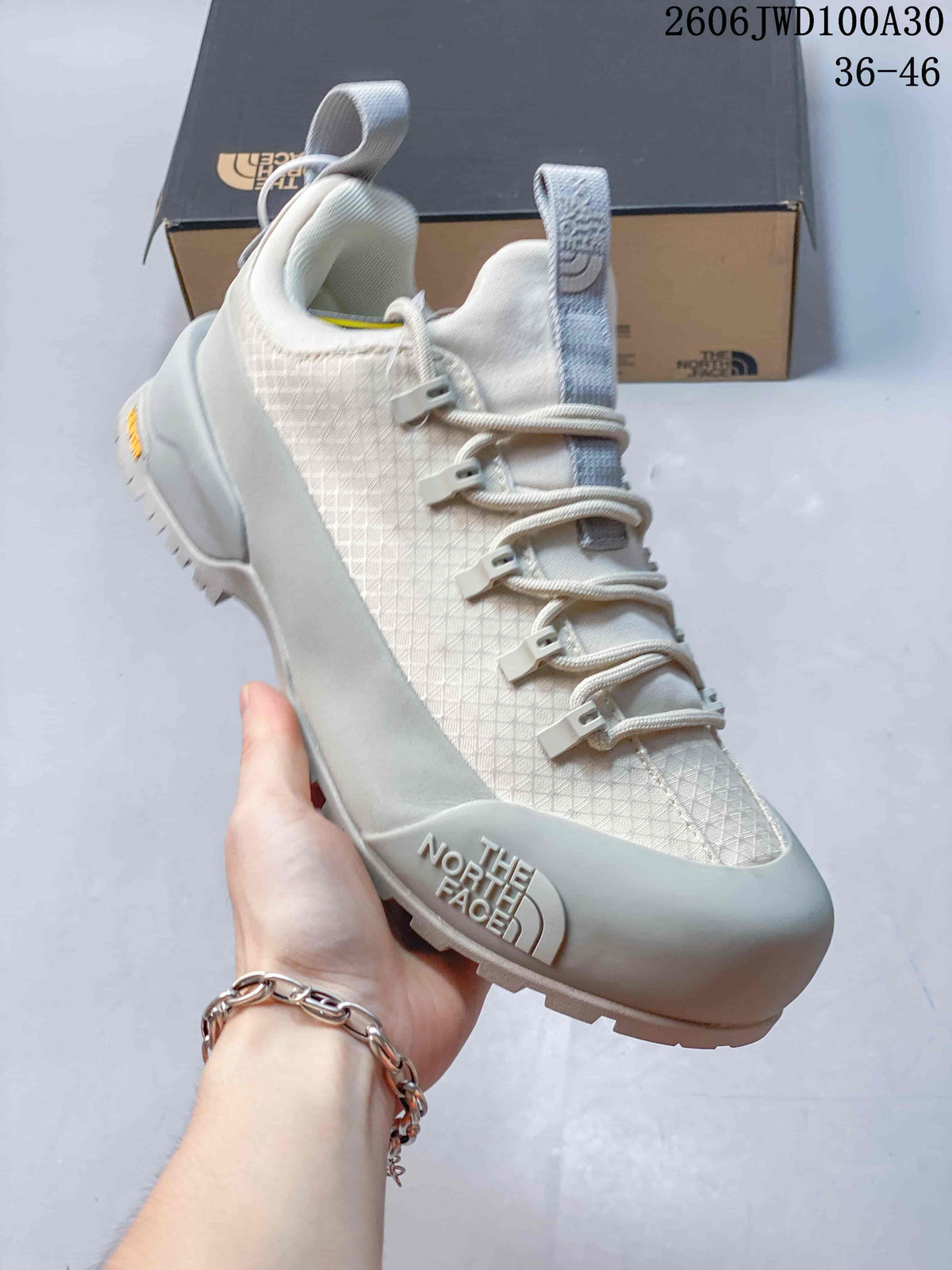 Angled front-side view showing the shoe's upper, laces, and protective toe area