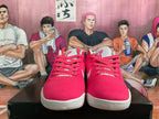 Front view of pink Nike Kobe basketball shoes with matching laces and white soles