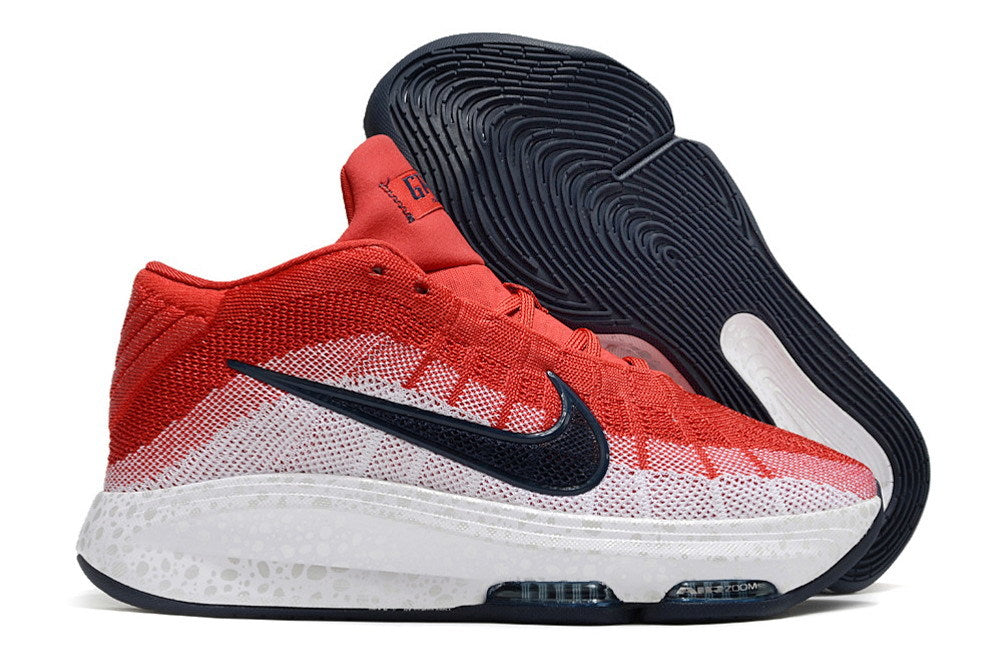 Side view of the red and white Nike GT Hustle 3 with the outsole visible.