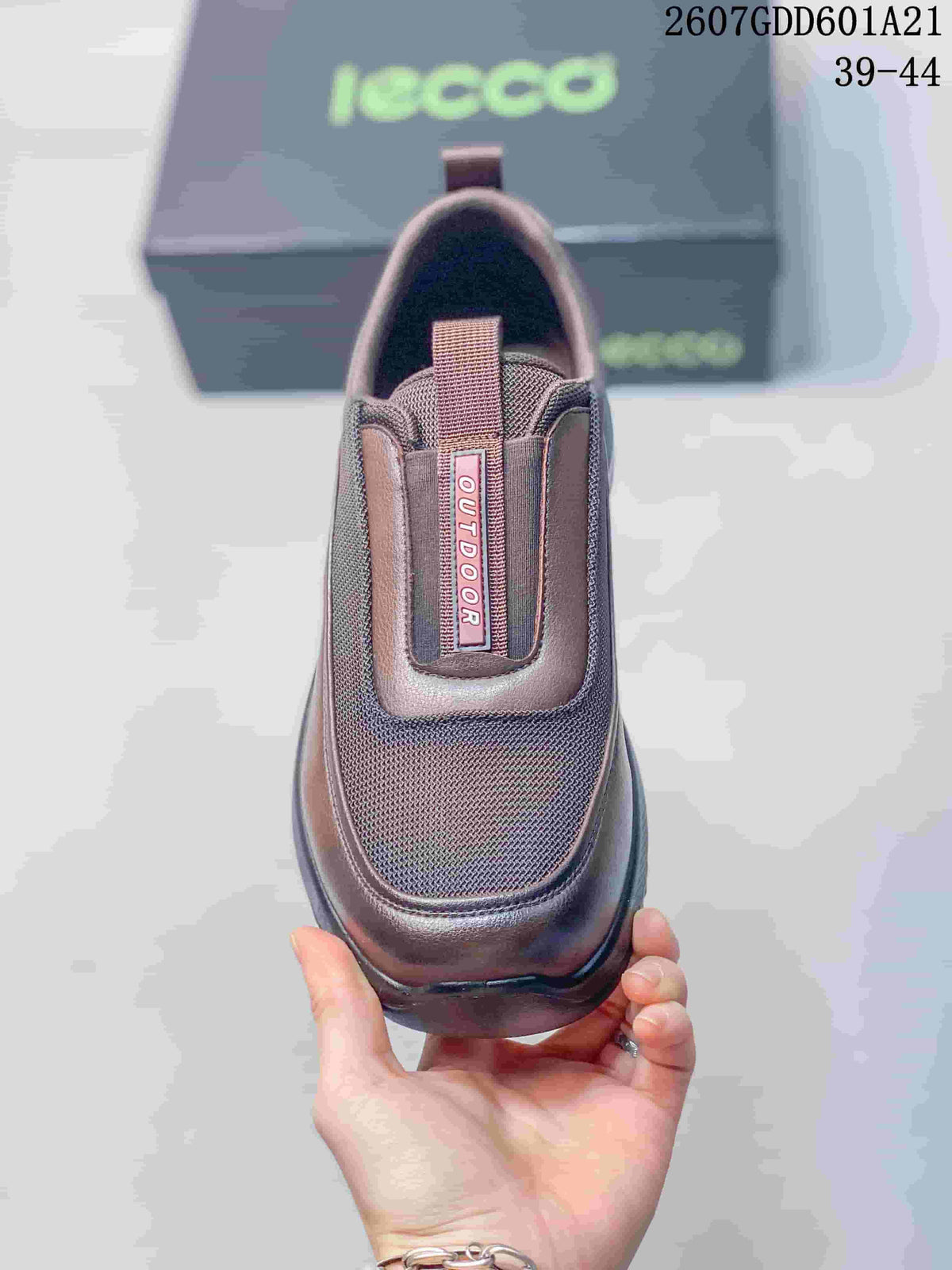 Top view of the brown ECCO slip-on shoe showing the textile vamp, elasticated opening, and OUTDOOR label.