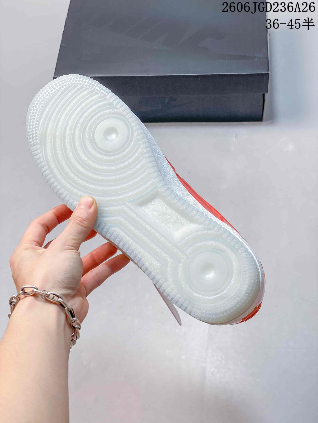 Underside of the sneaker showing its circular-patterned outsole