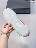 Underside of the sneaker showing its circular-patterned outsole