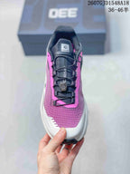 Top view showing the pink toe box, black tongue and dial-style closure.
